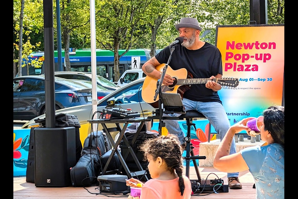 Musician Ranj Singh performs at the temporary Newton Pop-Up Plaza in Surrey on Aug. 14, 2024.