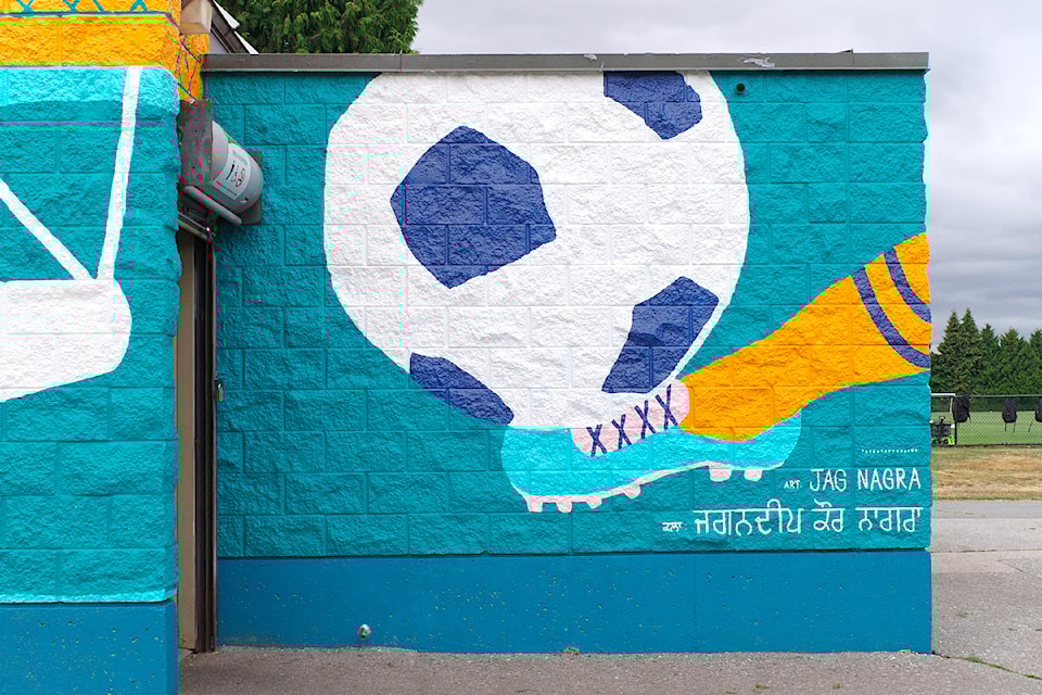 Section of a new "Community in Bloom" mural by visual artist Jag Nagra on the washroom/community room building at Newton Athletic Park in Surrey. 