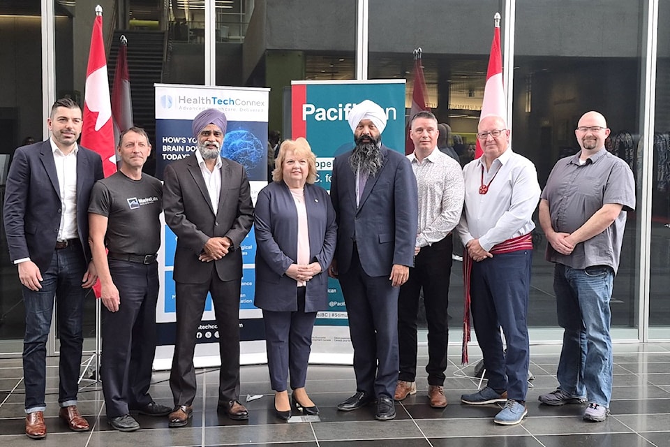 Politicians and funding recipients at a PacifiCan news conference at Surrey City Hall on Monday, March 3, 2025. Pictured from left are Anton Solonnikov, VitaminLabs (funding recipient), Christopher Moreno, MarineLabs (funding recipient), federal Minister Harjit S. Sajjan, Surrey Mayor Brenda Locke, Parliamentary Secretary Randeep Sarai,
Dr. Ryan D’Arcy, HealthTech Connex (funding recipient), Shaun McCumber, Mustimuhw Information Solutions (funding recipient) and Steven DeBoer, 4AG Robotics (funding recipient).