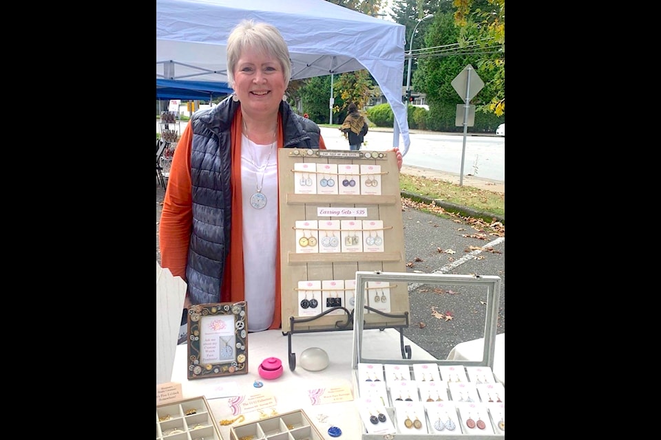 Surrey Urban Farmers Market vendor Maureen Goosen with jewelry she makes.