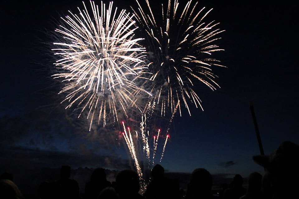 The fireworks display along the lake drew in the crowds. The show started just after 11 p.m. and lasted for about 15 minutes. Photo by Megan Roth