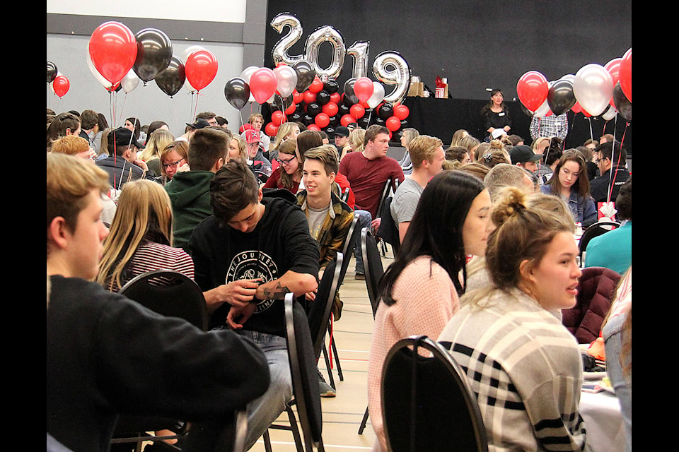 The Community Centre was full as Grade 12 students at a delicious lunch provided by the Bibles for Grads Committee and watched a performance by the Burman University Acronaires.