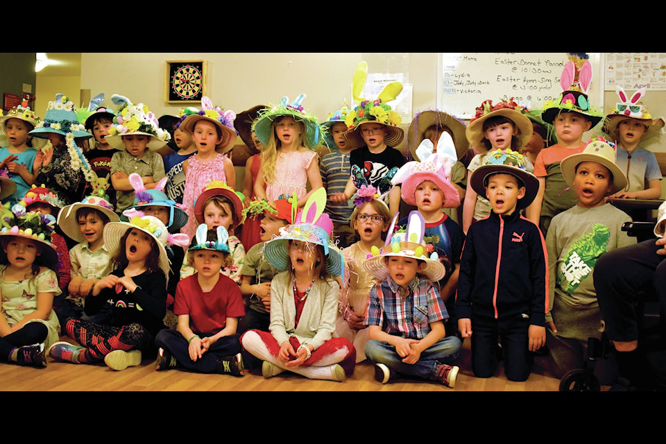 The Kindergarten classes from Ecole Our Lady of the Rosary serenaded Bethany Sylvan Lake residents at the annual Easter Bonnet Parade on April 18. The kids also showed off their homemade Easter-themed head wear. Photo by Kaylyn Whibbs/Sylvan Lake News