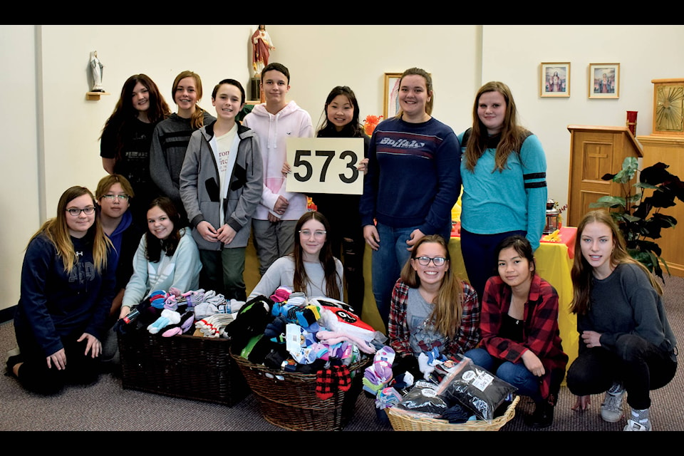 The Ecole Mother Teresa Catholic School’s Leadership Team collected 573 pairs of socks to donate to the Safe Harbour Society during their Socktober fundraiser. The items will be donated to the homeless as socks are the most in need item during the winter months. Socktober ran throughout the month of October and towered over the goal of 200 socks. Photo by Kaylyn Whibbs/Sylvan Lake News