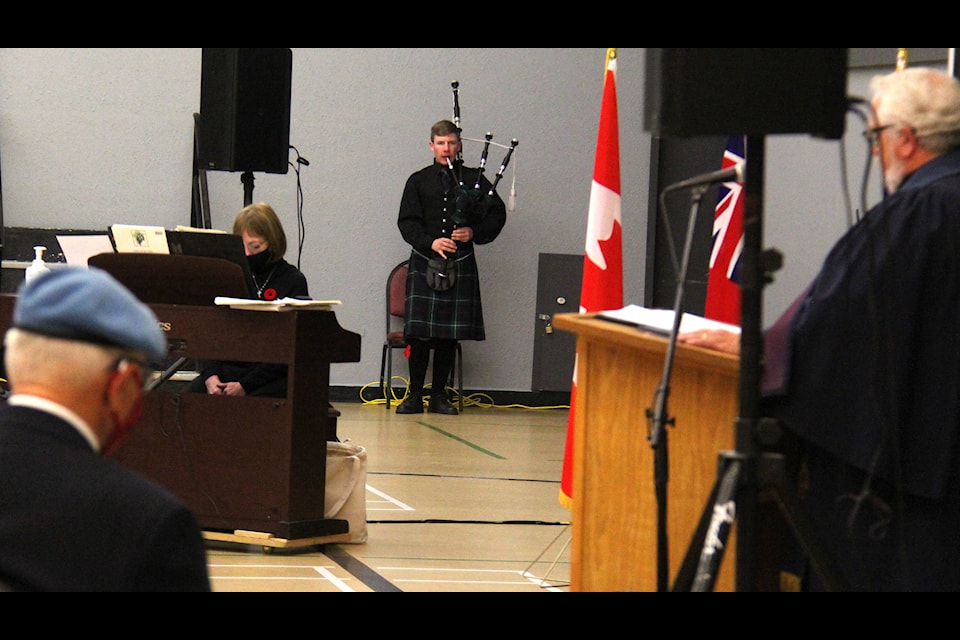 Piper Logan Lacasse plays “Amazing Grace” during the Remembrance Day service, Nov. 11. (Photo by Megan Roth/Sylvan Lake News)