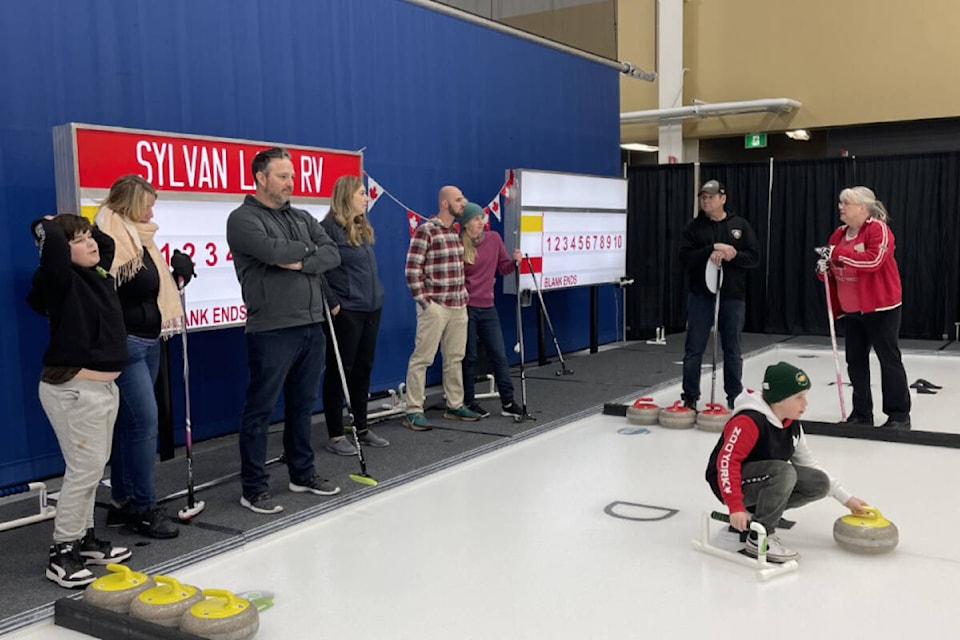 Residents gathered to learn about Curling during the Sylvan Lake Curling Club’s Curling Day in Canada event on Feb. 25. (Contributed by Crystal Graham to Sylvan Lake News)