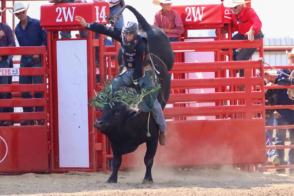 Dawson Shannon rides to no-score during professional bull riding action during day four Ponoka Stampede action. (Kevin Sabo/Black Press Media)