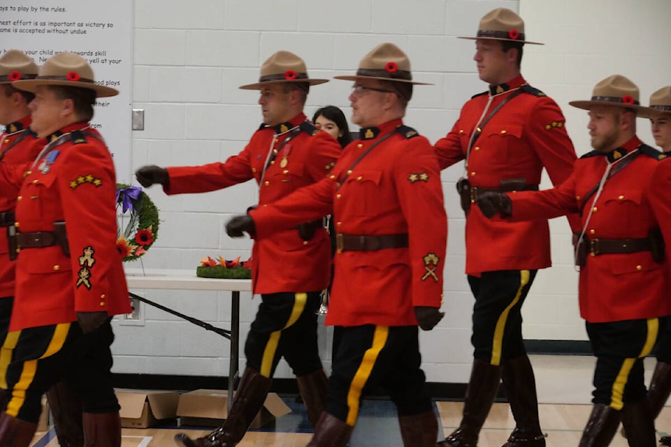 Members of the RCMP were part of the procession during the Remembrance Day service on Nov. 11 at Fox Run School. (Sarah Baker/Sylvan Lake News photo)