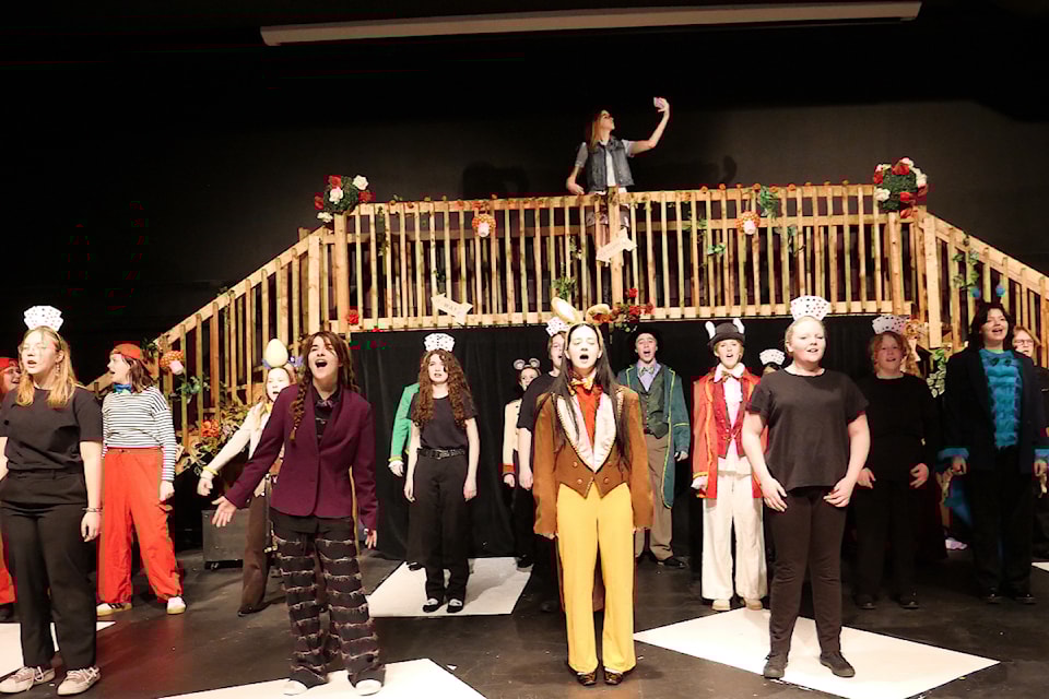 The cast of 'Alice in Wonderland' performs the show's opening number. 