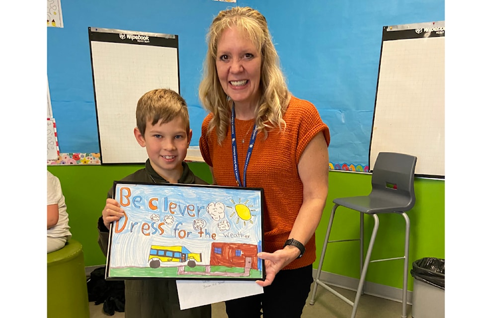 Grade 3 Beacon Hill Elementary School student Easton McCulloch drew one of the winning school bus safety competition entries. 