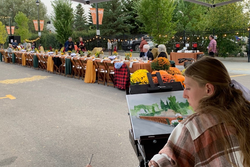 Local artist Jayden Blackwood did a painting at the event which was later auctioned off to raise funds for the Sylvan Lake Hockey Camp. 