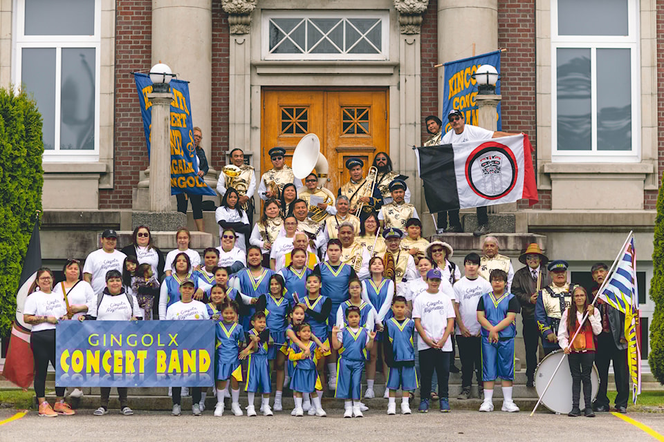 The Gingolx Majors and Majorettes and concert band at 2023 Seafest in Prince Rupert. This photo was taken in front of the Prince Rupert courthouse.