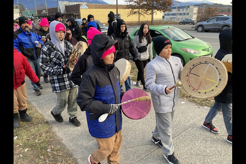 Young drummers lead a memorial march Nov. 26, 2024 on the first anniversary of the death of Sebastian Moore.