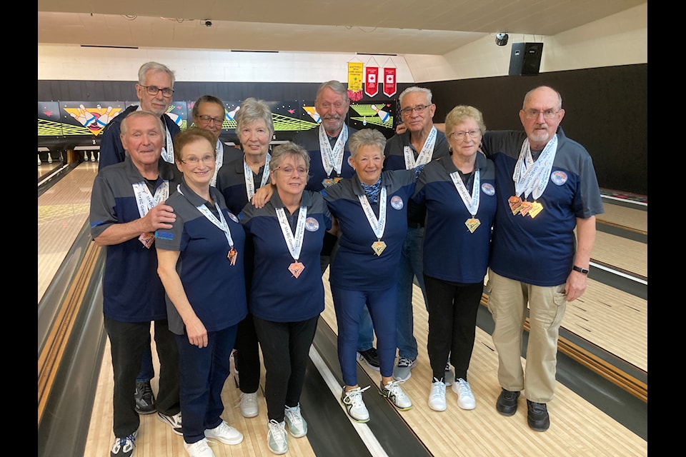 Seniors bowlers competing at the 55+ B.C. Games were back row, left to right, Bob Price, Holly Cowman, Alfreda Price, Greg Cowman, Roland Lagace. Front row, left to right, Brian Turner, Albertine Lagace, Deb Burkett, Carol Campbell, Chris Olson and Gordon (Ted) Moss. 