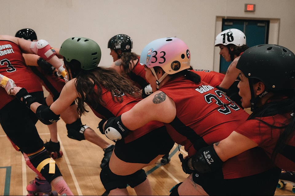 North Coast Nightmares skaters do a training exercise known as the "pain train" during a training session. The person in front has to pull everyone who is behind them around the track while those behind just hold on. It's called the pain train because it's tough on the muscles in your legs.