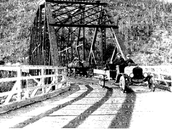 With Sam Kirkaldy driving, provincial lands minister Duff Patullo crosses the old Skeena bridge on its 1925 opening. At the time, Patullo represented the Prince Rupert riding in the provincial legislature. He would go on to become premier.