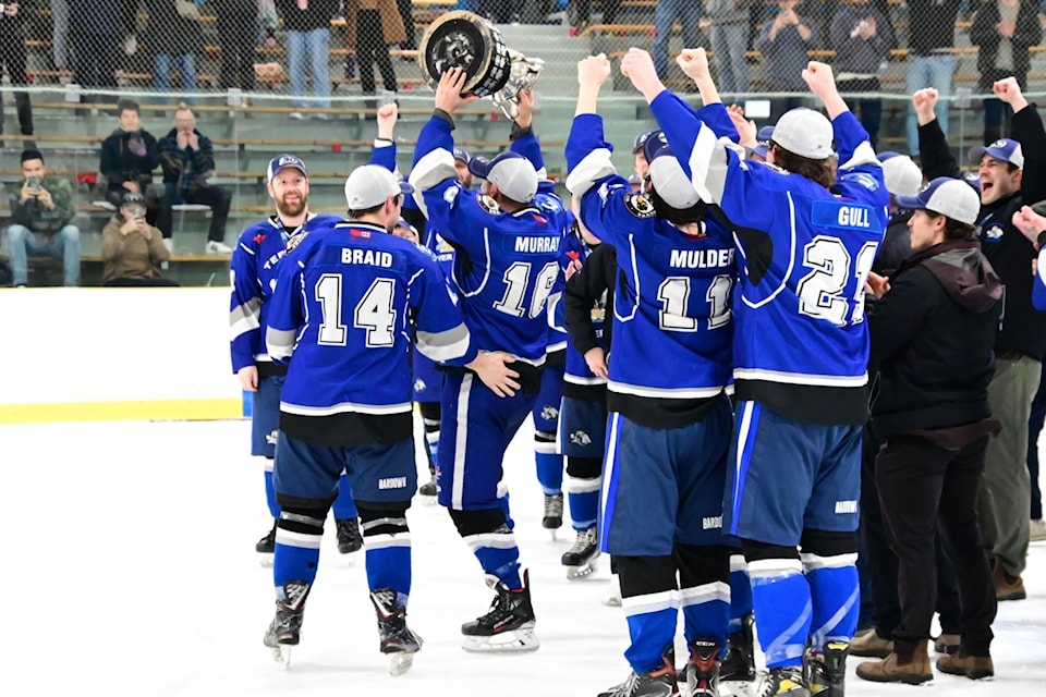 Terrace's Tristan Murray lifts the trophy after the River Kings' 5-4 victory over the Rossland Warriors in the 2025 Coy Cup final.