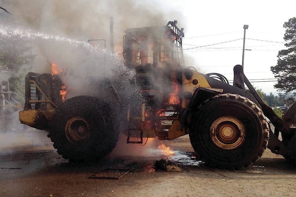 8063410_web1_copy_170816-TST-skeena.sawmills.loader.fire