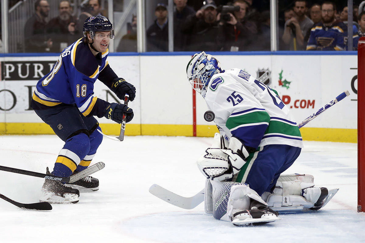 14718721_web1_181209-IFD-Canucks-Blues3