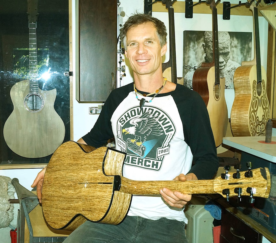 25019111_web1_210429-SNM-Hemp-Guitar-Guy2-PHOTO_1