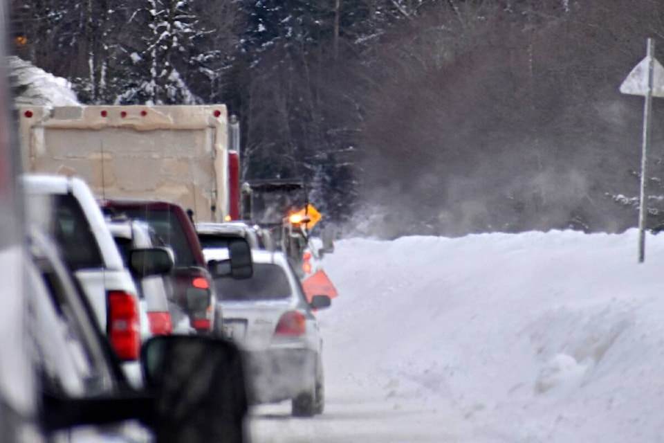 Traffic is stopped along Highway 16 on Dec. 23, between Prince Rupert and Terrace for crews to clear snow blockages along the main travel route. (Photo: K-J Millar/The Northern View)
