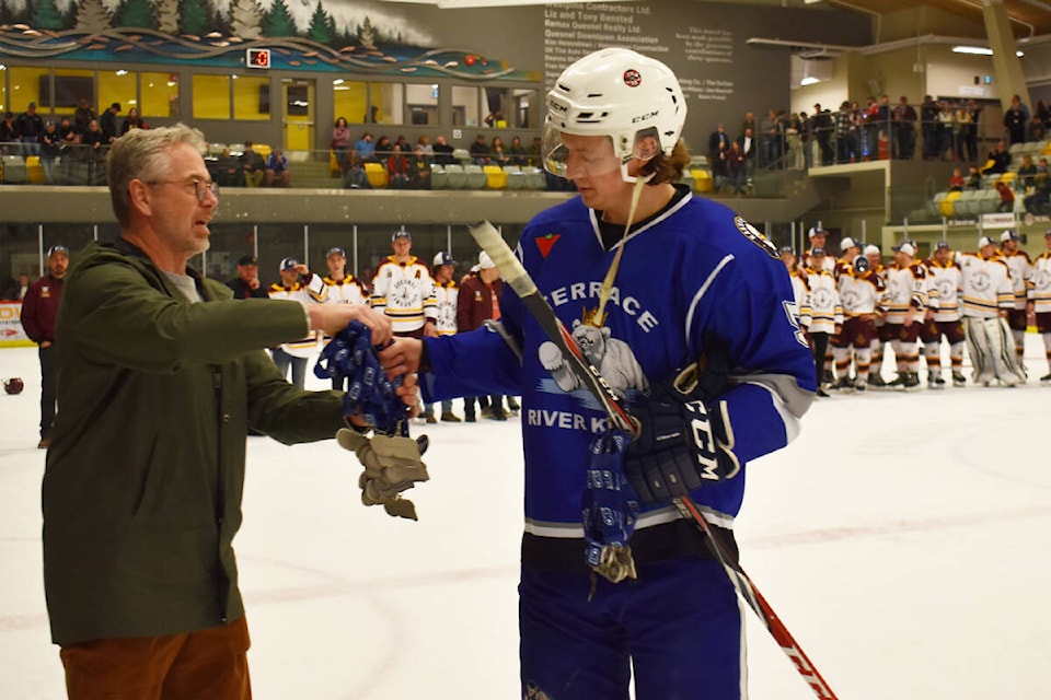 Terrace River Kings player Nick Nordstrom represented the team in accepting the Coy Cup silver medals from BC Hockey’s representative. The Quesnel Kangaroos took the Coy Cup April 1 in Quesnel. (Frank Peebles photo)