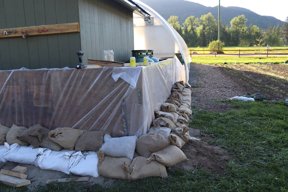 The greenhouse at the Hidden Acres Farm and Treehouse Resort in Terrace, sandbagged and barricaded in anticipation of flooding. May 16 2023, (Hunter Wild/Northern Sentinel).
