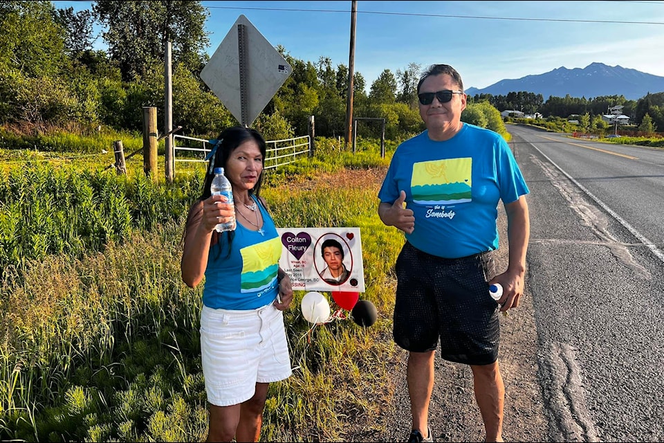 Participants Sadie Cote and Leo Naziel pause for some water during the Tears to Hope Relay Run in Smithers on June 24, embodying the spirit of community and resilience as they join in the effort to raise awareness for missing and murdered individuals in northwest B.C. (Tears to Hope Society/Facebook)