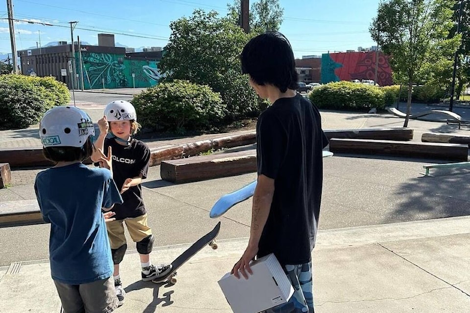Three young skateboarders enjoy the festivities at Terrace’s Go Skate Day event at George Little Park on June 21, marking the return of the international tradition to the city after a hiatus due to the COVID-19 pandemic. (Courtesy of Peter Hunter)