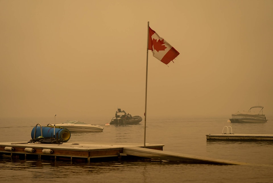 33724414_web1_230828-CPW-Wildfires-shuswap-damage-smoke_1