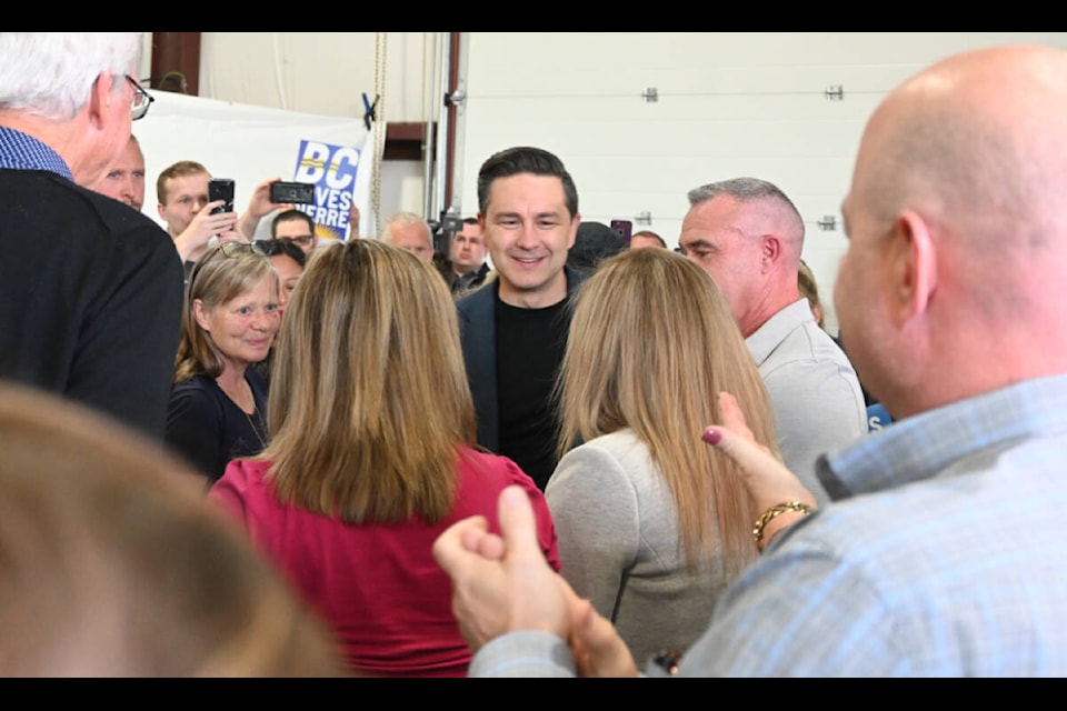 Conservative Party of Canada leader Pierre Poilievre shaking hands with potential voters. The opposition leader stressed firearm rights, the housing crisis and crime during a Sept. 14 rally in Terrace. (Seth Forward/Black Press Media)