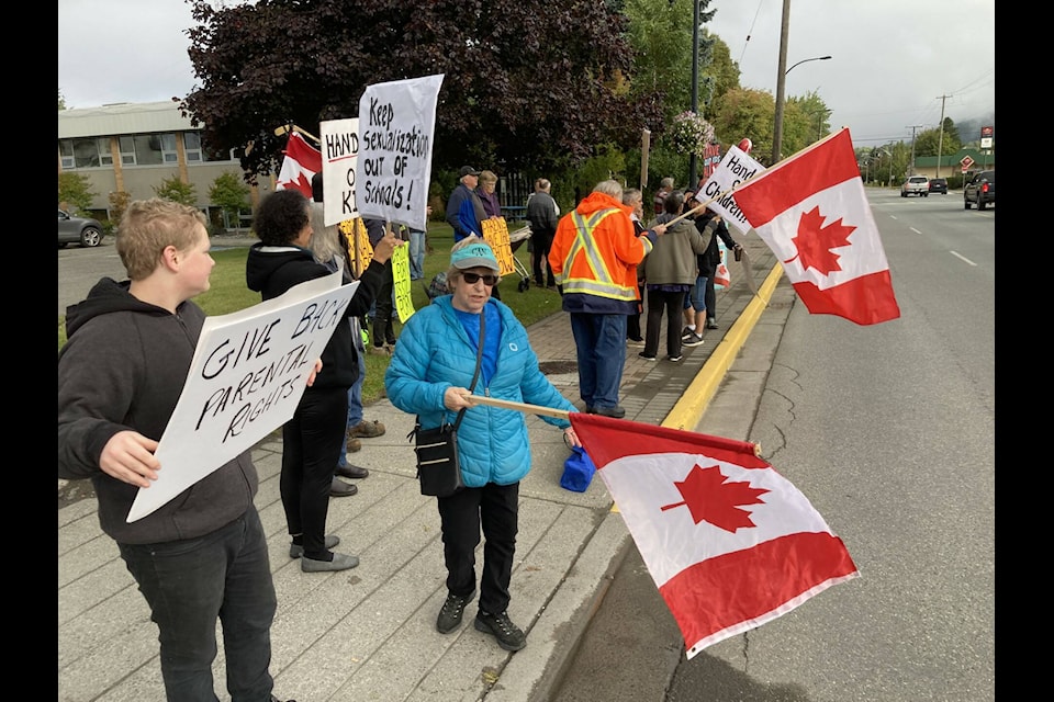 Protesters of the provincial sexual orientation gender identities (SOGI) school curriculum gathered first at the Coast Mountains School School District 82 office on Kenney Street in Terrace on Sept. 20 before marching to Terrace City Hall. (Staff photo)