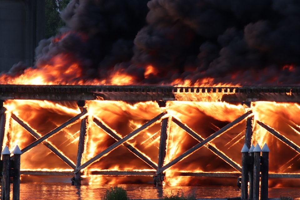 A fire at a train trestle in Richmonday on June 20 led to thick black smoke in the Metro Vancouver region.