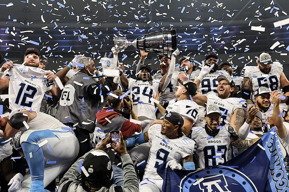 Deonta McMahon celebrates with the Grey Cup as the Toronto Argonauts defeated the Winnipeg Blue Bombers in the 111th Grey Cup at BC Place in Vancouver, British Columbia on Nov. 17, 2024.