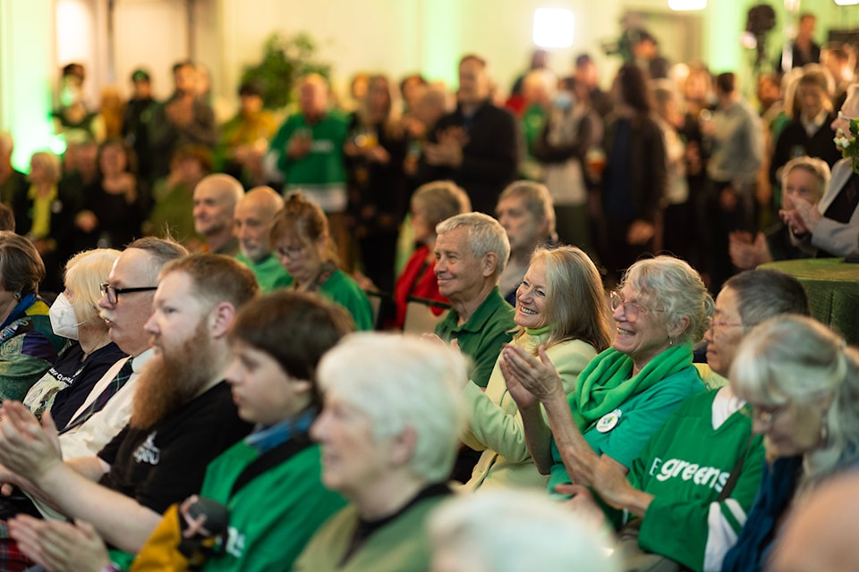 B.C. Green Party supporters gather in Victoria Saturday, Oct. 19, 2024 ahead of the polls closing.