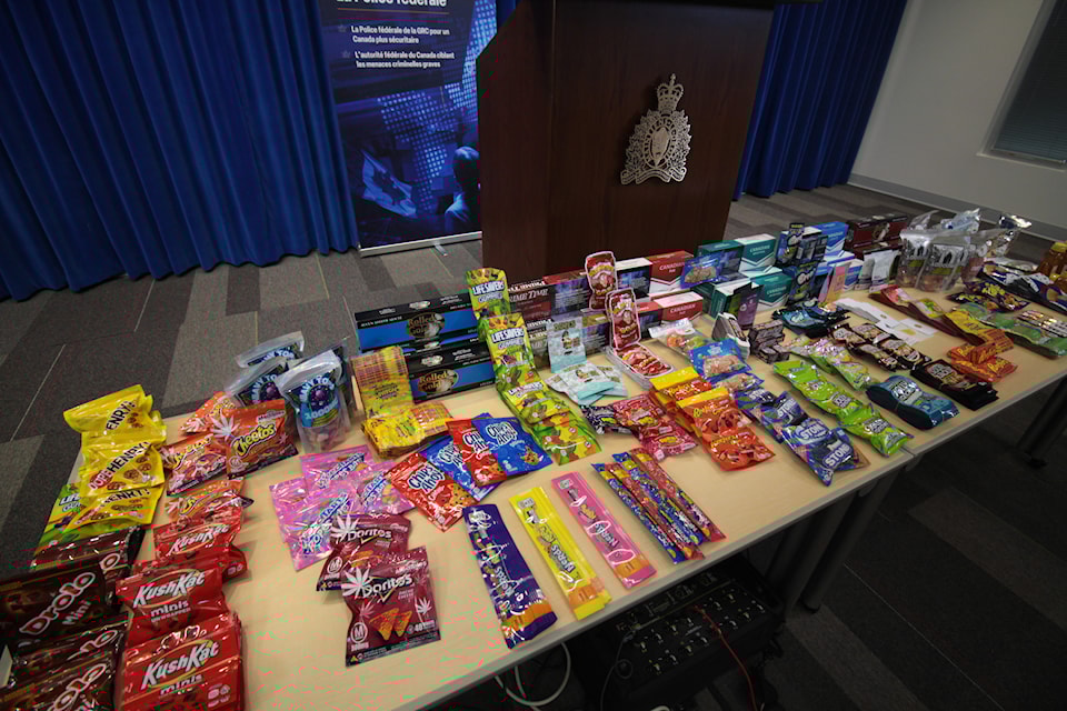 Federal RCMP investigators say officers have taken down an organized crime group, seizing thousands of counterfeit cannabis-laced candies from dispensaries in Port Alberni and Lantzville. Some of the candies and snacks, pictured on Oct. 29, 2024, were packaged to look similar to non-cannabis-infused treats. (Lauren Collins/ronaldomanosa)