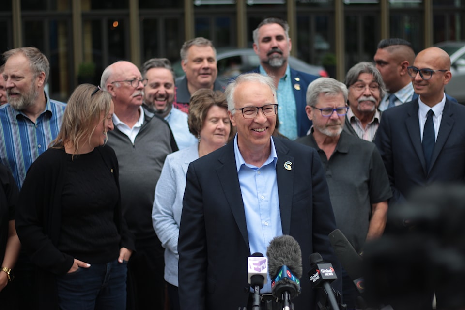 B.C. Conservative Leader John Rustad speaks to reporters in Surrey on June 25, 2025.