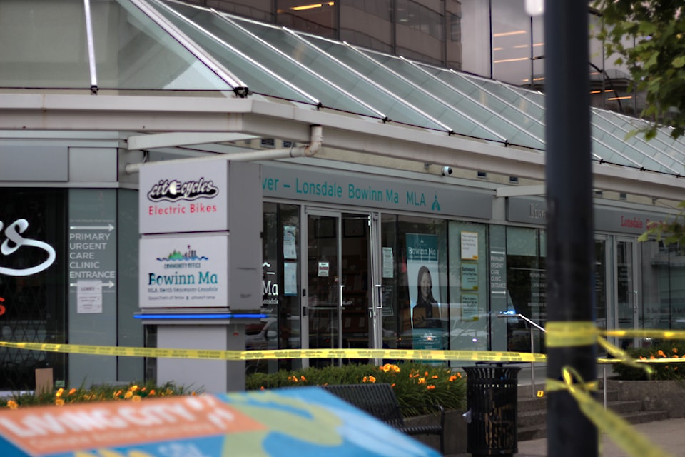 North Vancouver Lonsdale MLA Bowinn Ma's constituency office is behind police tape Friday, June 27, 2025 after an "explosive device" went off near the front door of the office. North Vancouver RCMP is investigating. 