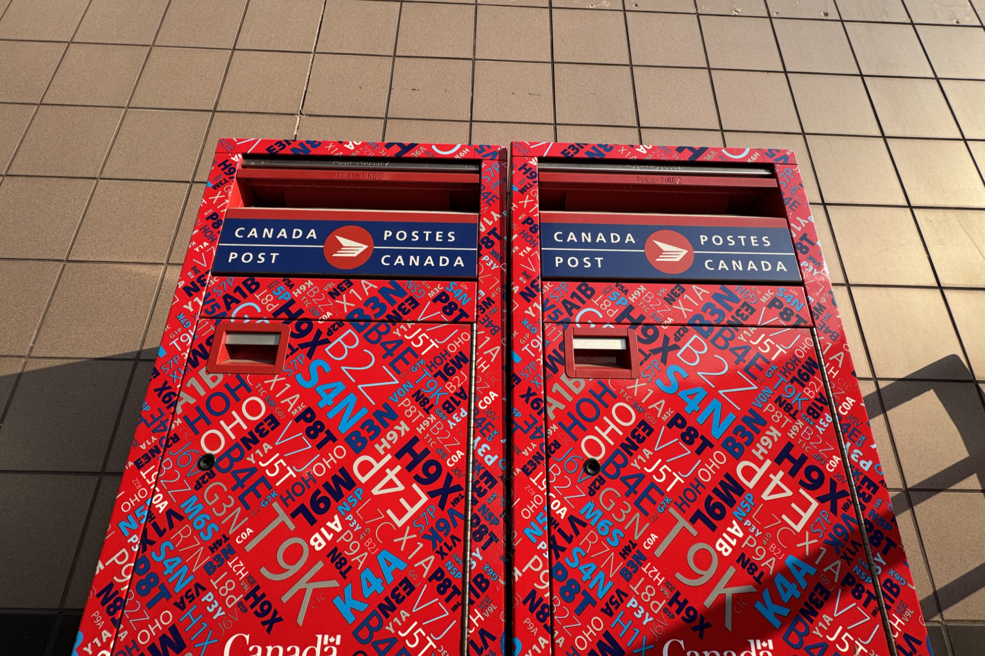 Feds direct Canada Post to end door-to-door delivery