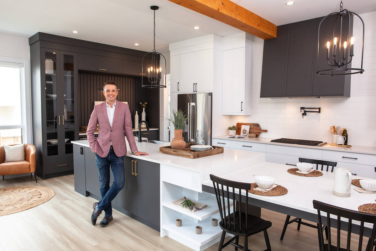 Millionaire Lottery spokesperson Todd Talbot stands in the $3.2 million Langley house that is one of the top prizes in this years draw. (Special to Langley Advance Times)