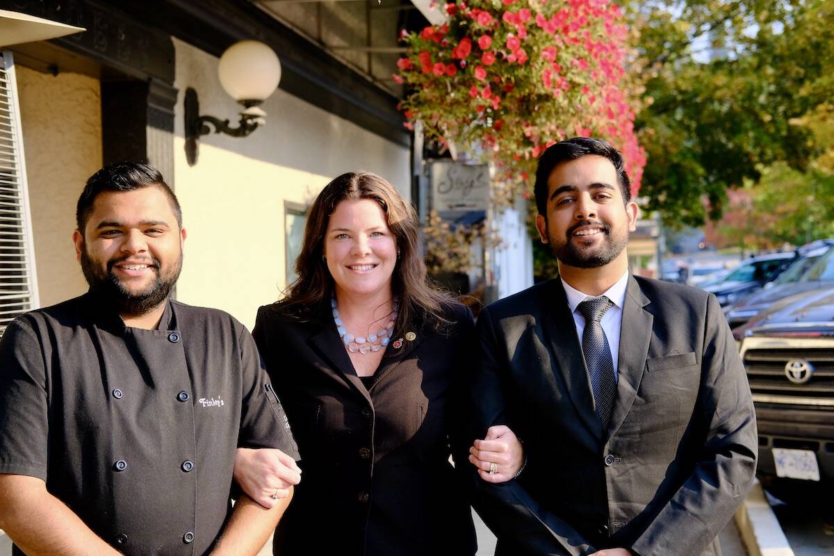 Chef Rahul Joshi (left) and Harman Deep Singh (right) with their employer Tanya Finley of Finleys Bar and Grill. Singh is a student in the culinary management program at Selkirk College, and Rahul is a 2019 graduate. Photo: Bill Metcalfe