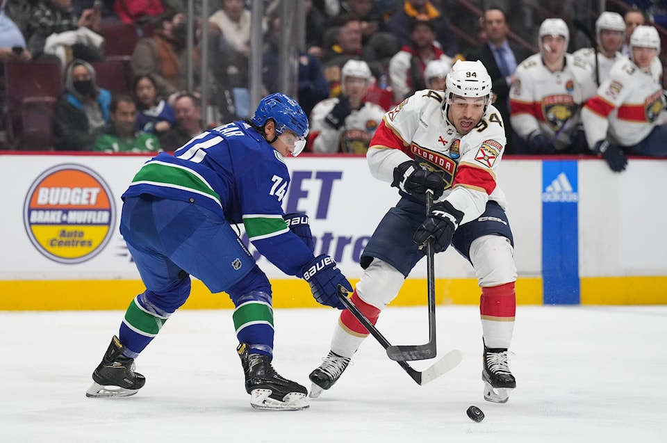 31189881_web1_221201-CPW-Panthers-Canucks-canucks_1