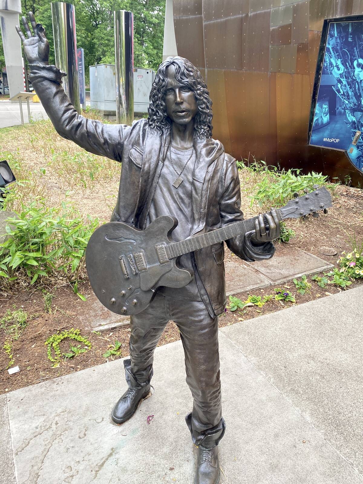 Bronze statue of Soundgardens Chris Cornell on a sidewalk outside MoPOP. (Photo: Tom Zillich)