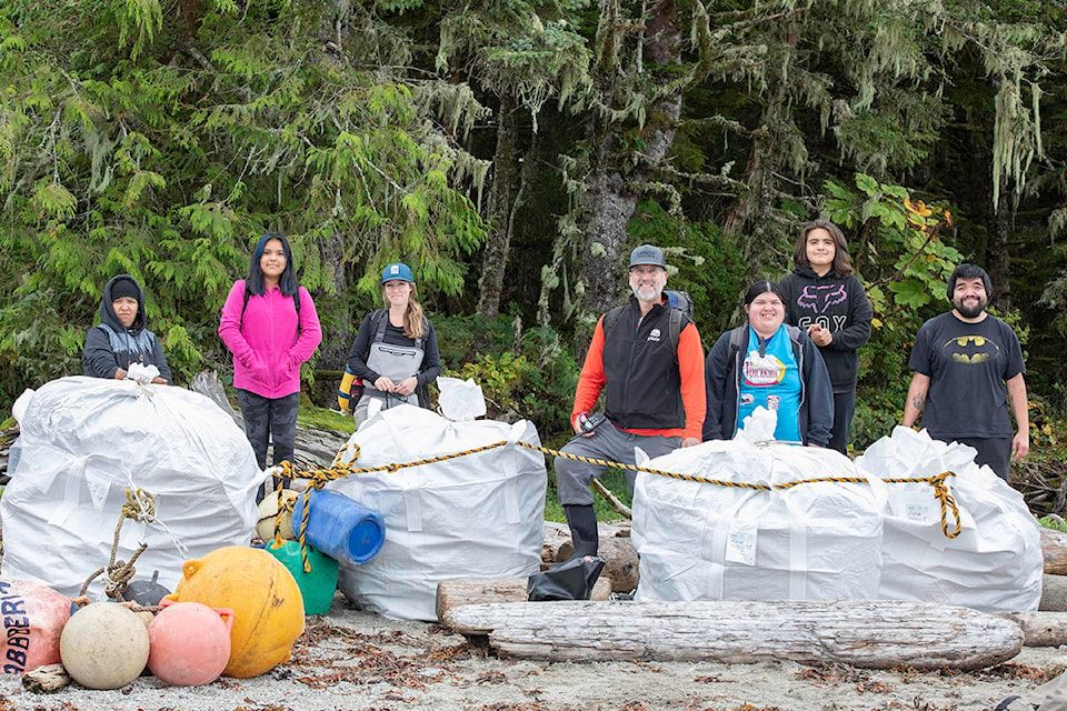 Crew photo with four mega bags and a necklace of abandoned buoys. (Jack Plant photo)