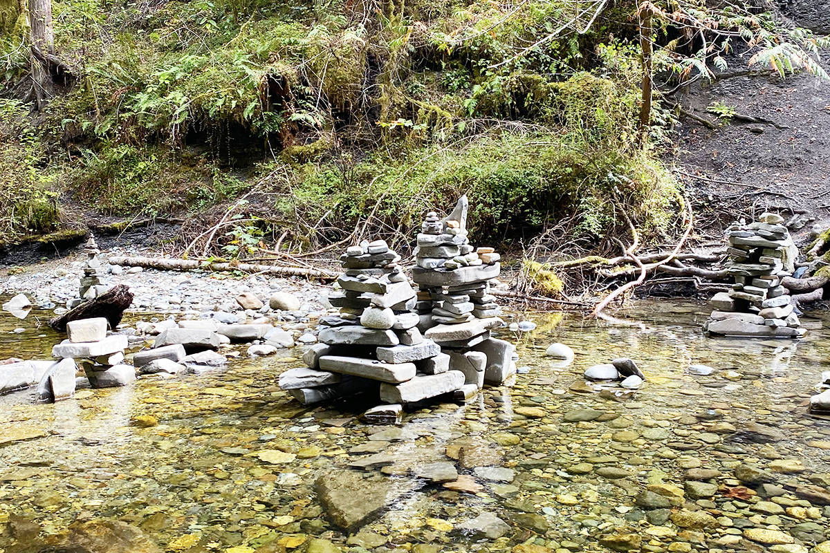 Lining the rivers shore are inukshuks built by explorers before us, so we had to build one to sit amongst the others.
