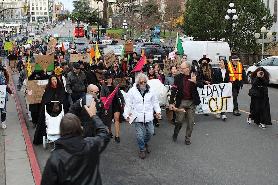 Environmental demonstrators march down the streets of Victoria on Nov. 20. (Jake Romphf/News Staff)