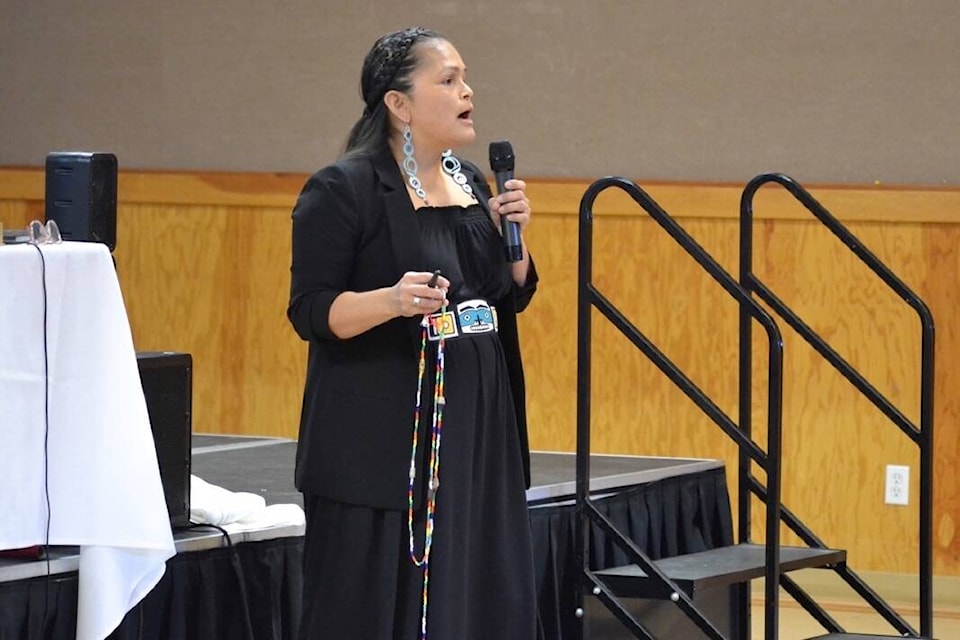Indigenous wellness and healing specialist Anita Charleson-Touchie of Ucluelet First Nation holds a Bead Timeline at the Nov. 2 health forum. (Nora O’Malley photos)