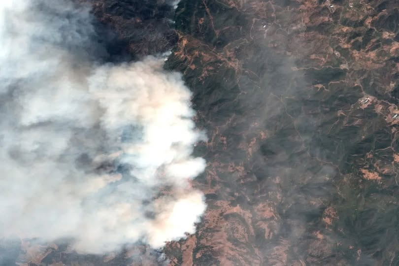 Smoke from a wildfire 12 km south of the Canada-U.S. border.