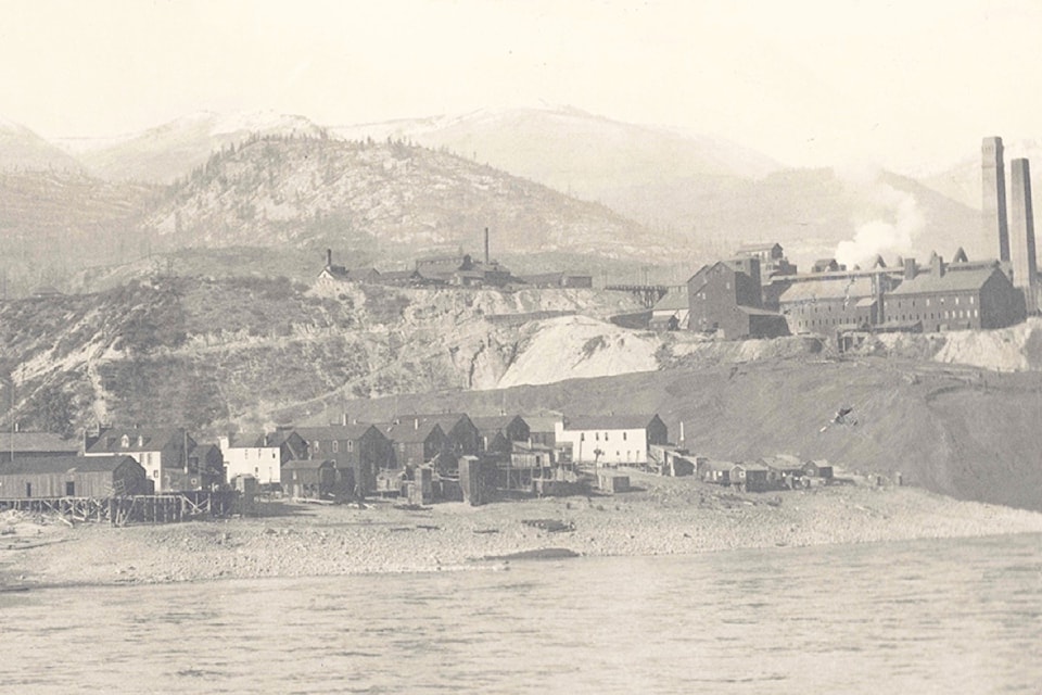 This image shows the mouth of Trail Creek flowing into the Columbia River under the Bowery Bridge in the early 1900s. 