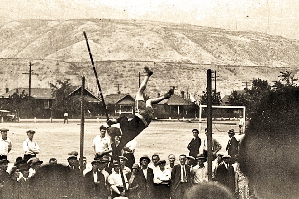 In this photo, we see a young athlete pole vaulting, surrounded by engaged spectators in an unknown year. Perhaps it was this very first regional meet. Swipe right for the full size image.